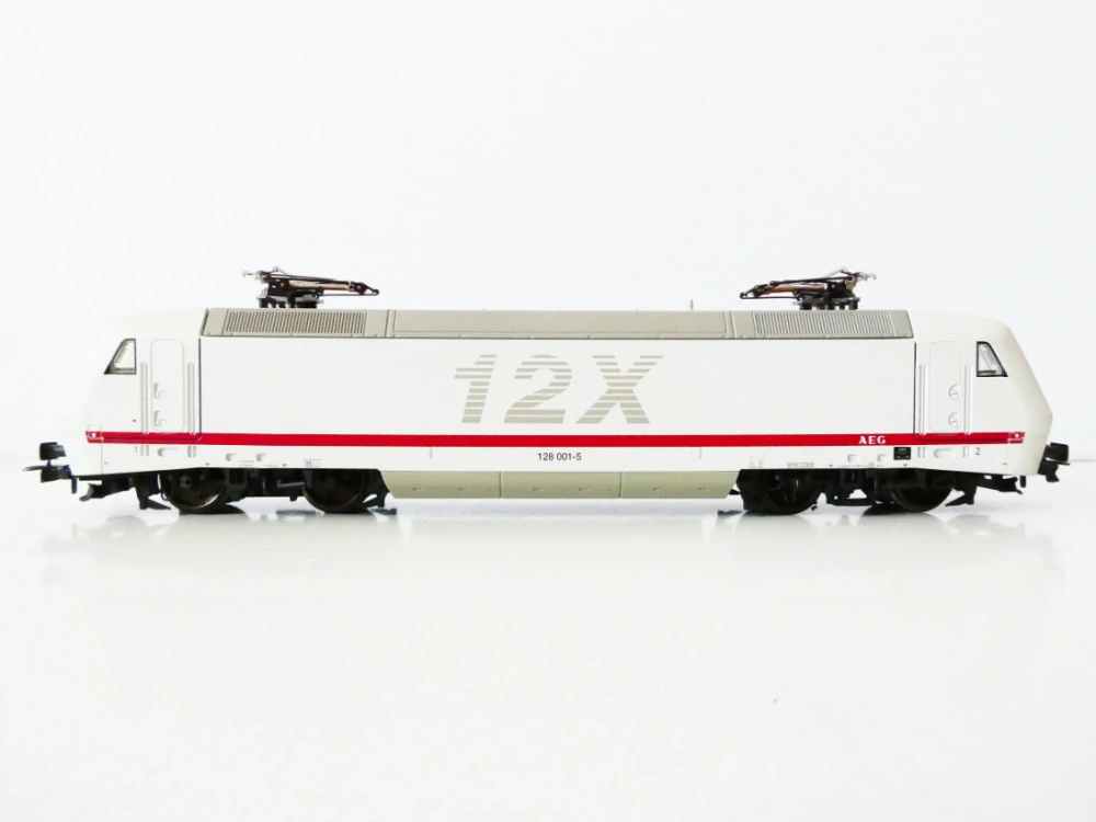 H0 Märklin HANO 38380 Elektrická lokomotiva 12X BR 128 001-2 AEG OSVĚTLENÁ TOP STAV v orig. krabičce s návodem