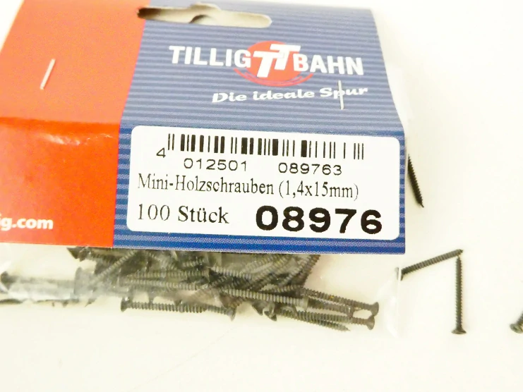 TILLIG 08976 SET 57 ks Šroubky k upevnění kolejí 1,4 x 15 mm NEPOUŽITÉ