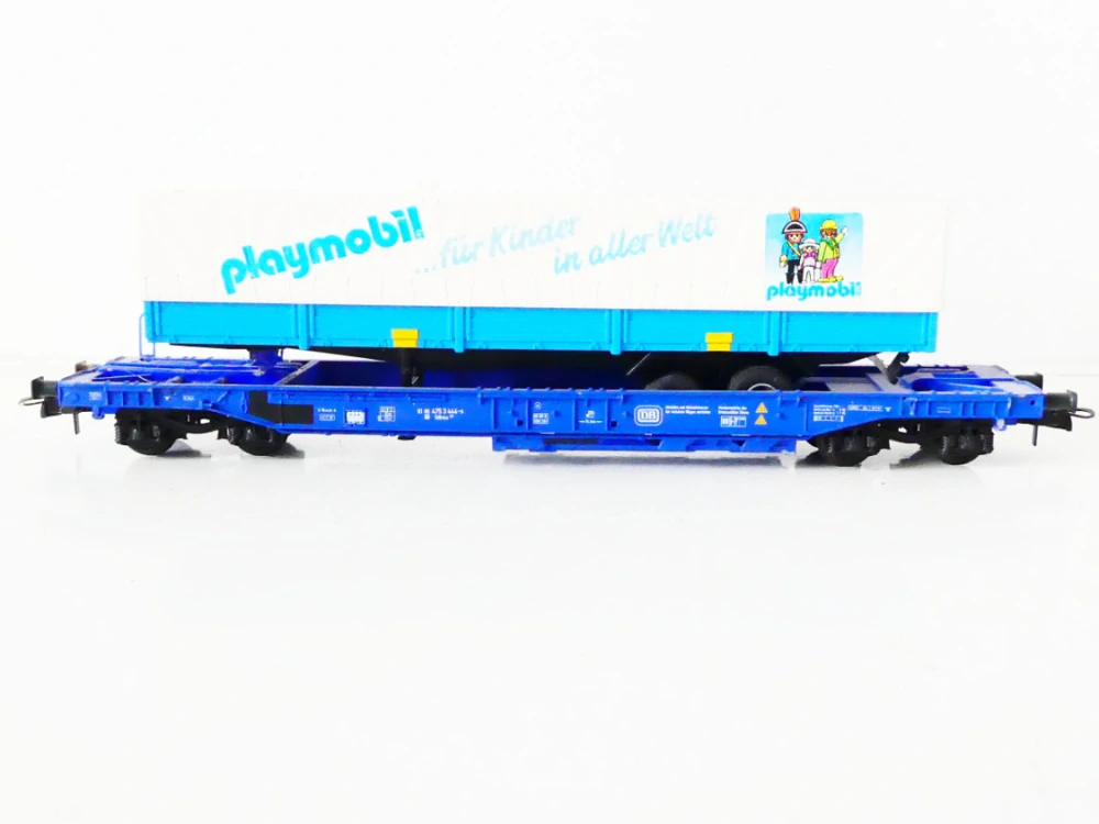 H0 ROCO 48014 Plošinový vůz s automobilovým návěsem Playmobil