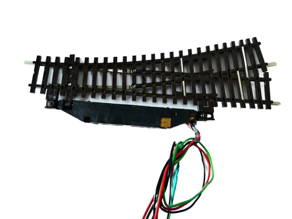TT PILZ/TILLIG Výhybka oblouková pravá 83321 - 15° 129,5 mm s elektrickým přestavníkem NA OPRAVU (výměna jedné pohyblibé kolejnice)
