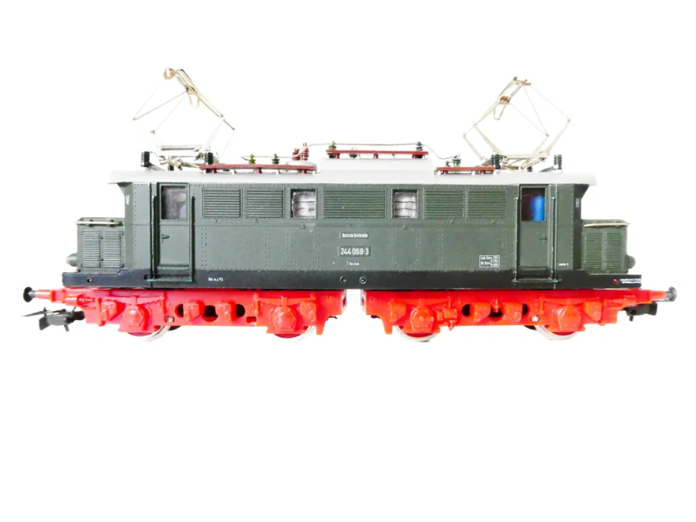 H0 PIKO Elektrická lokomotiva BR 244 068-3 DR OSVĚTLENÁ PĚKNÝ STAV