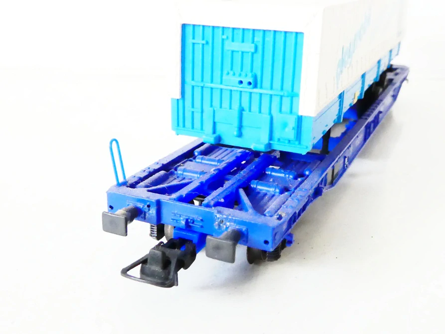 H0 ROCO 48014 Plošinový vůz s automobilovým návěsem Playmobil