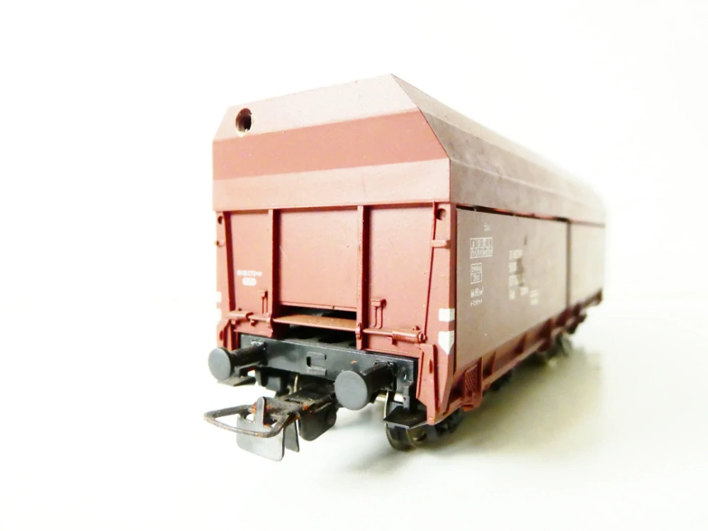 H0 PIKO Výsypný vůz 50 677 0824-0 se závěsem pro čištění kolejí DR PĚKNÝ STAV