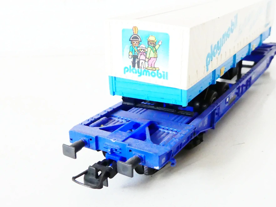 H0 ROCO 48014 Plošinový vůz s automobilovým návěsem Playmobil