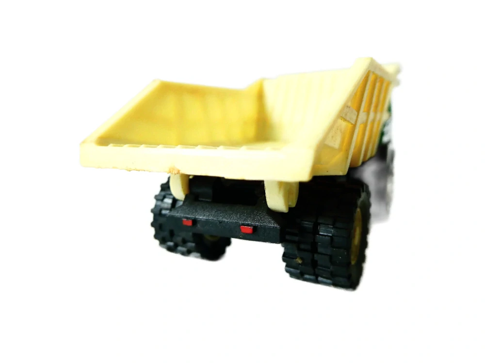 H0 VEB Plastspielwaren Berlin - Nákladní automobil Dumper Perlini v orig. krabičce NA OPRAVU (špatně drží valník)