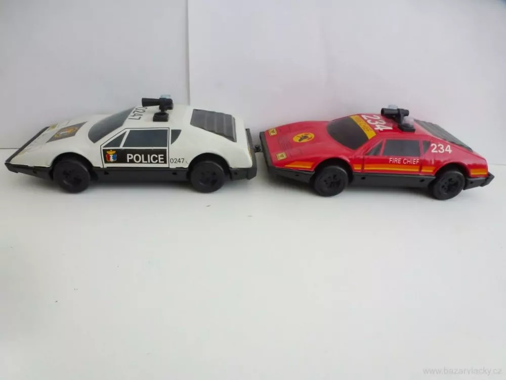 Plechový osobní automobil 2 ks - Policie - Hasiči - SETRVAČNÍK