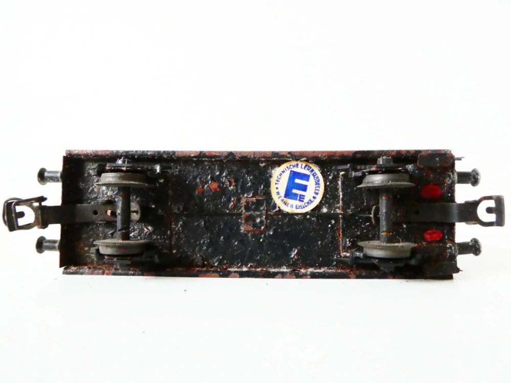 H0 Werner Ehlcke Plošinový vůz s budku brzdaře a s nákladem kovových skruží ANTIK