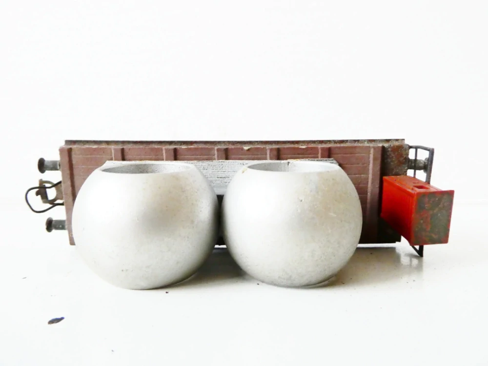 H0 Werner Ehlcke Plošinový vůz s budku brzdaře a s nákladem kovových skruží ANTIK