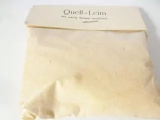 Přírodní lepidlo na trávu - Quell-Leim /  100 g