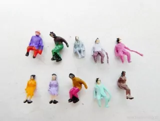 N Figurky 10 ks - Sedící cestující PĚKNÝ STAV 