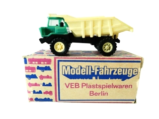H0 VEB Plastspielwaren Berlin - Nákladní automobil Dumper Perlini v orig. krabičce NA OPRAVU (špatně drží valník)