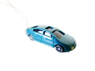 TT Osobní automobil zelený s el. kabelem